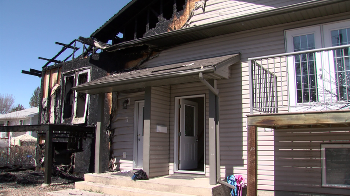 Tenants leave in a hurry following early morning fire in the Flats