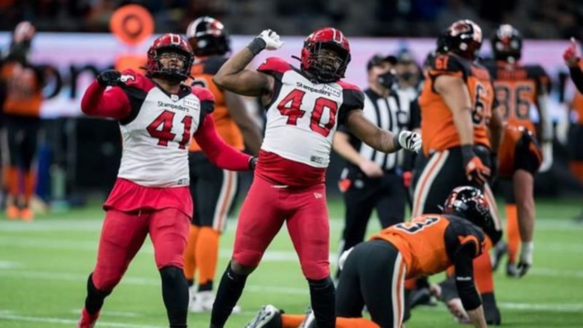 Stampeders clinch playoff spot, eliminate Lions with 33-23 win over B.C.