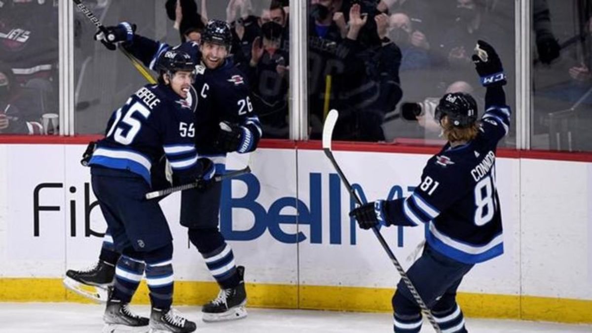 Winnipeg Jets center Mark Scheifele celebrates after scoring