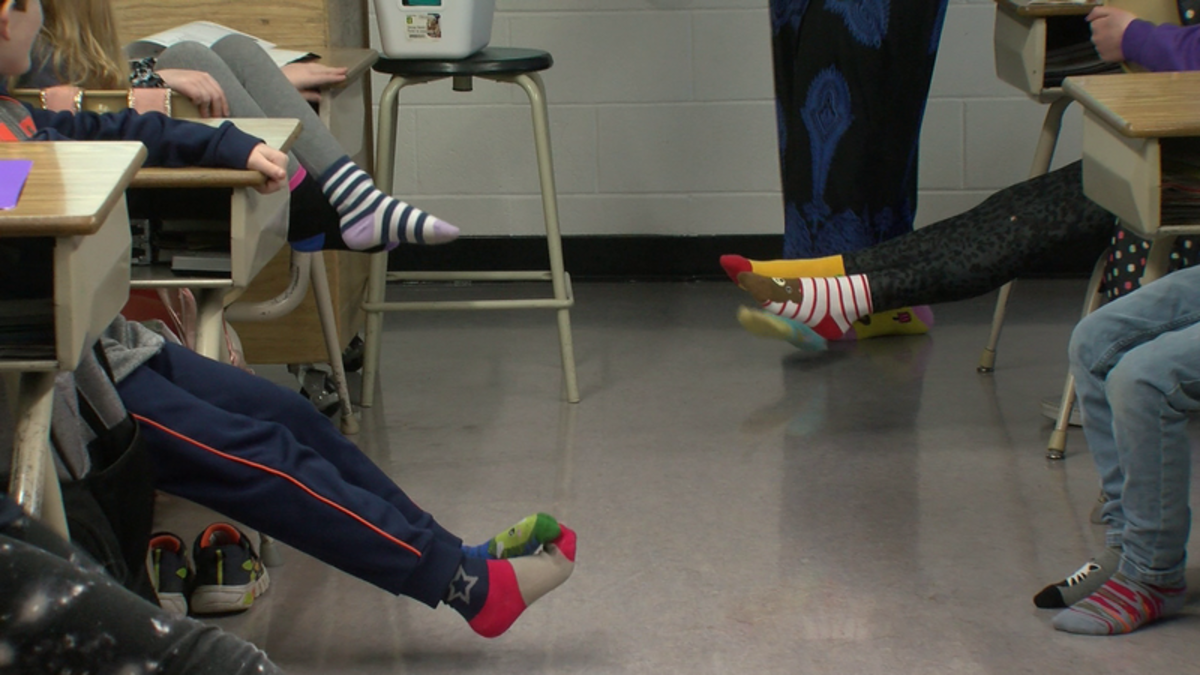 Mother Teresa students, staff wearing mismatched socks for World Down