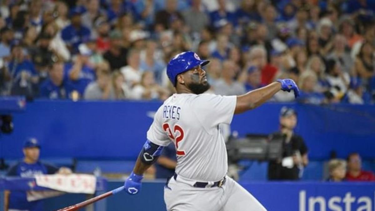 Reyes's homer, Hoerner's double help Cubs eke out 7-5 win over