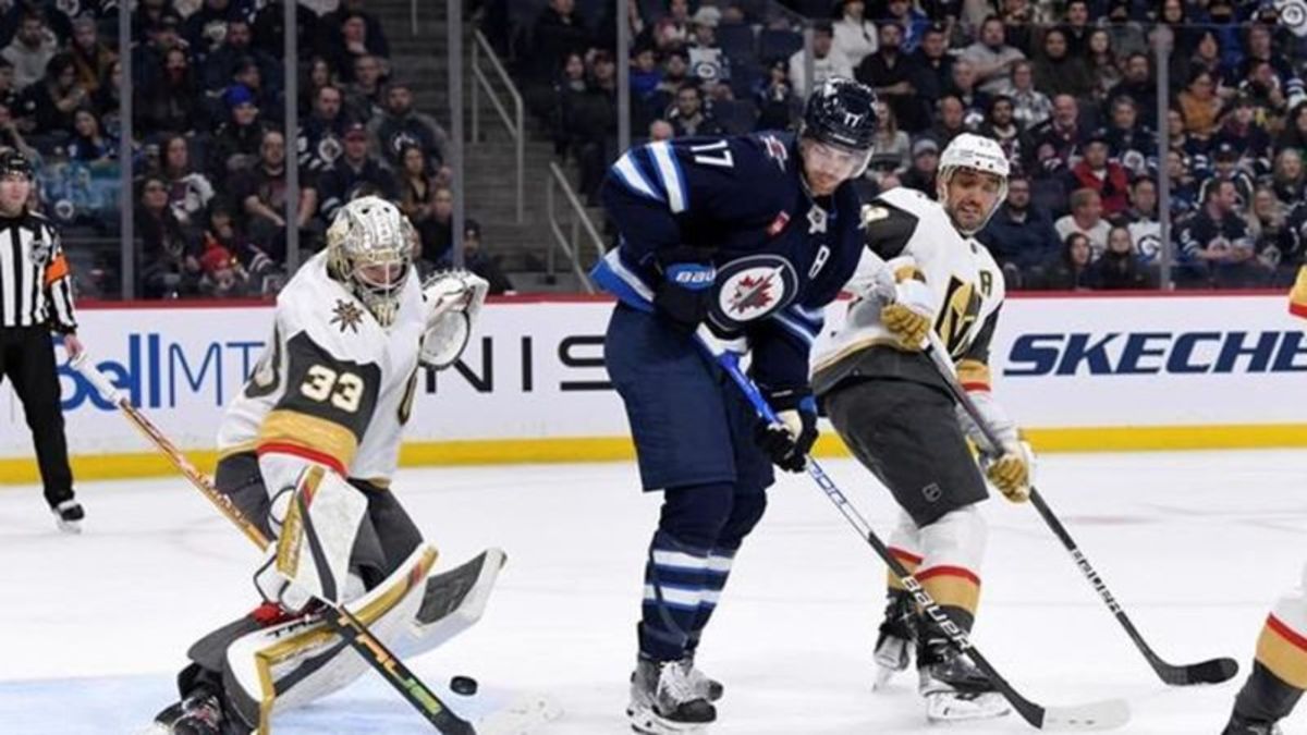 Wheeler scores 2 to lead Jets in 4-1 win over Blackhawks