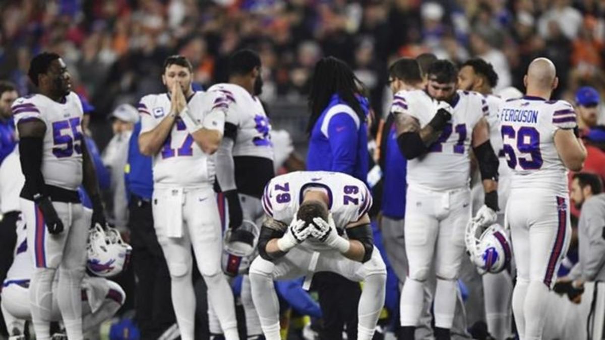 Damar Hamlin shows 'signs of improvement' while still in ICU in critical  condition, Bills say, after mid-game cardiac arrest