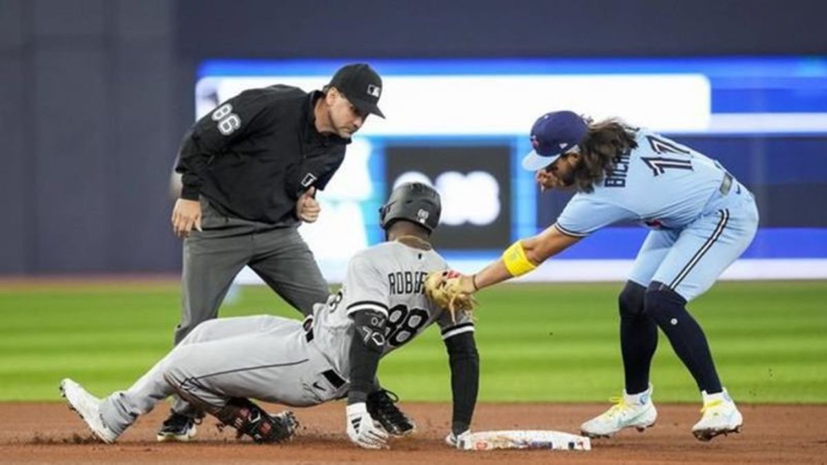 Whit Merrifield of the Toronto Blue Jays celebrates a 2 RBI double in  2023