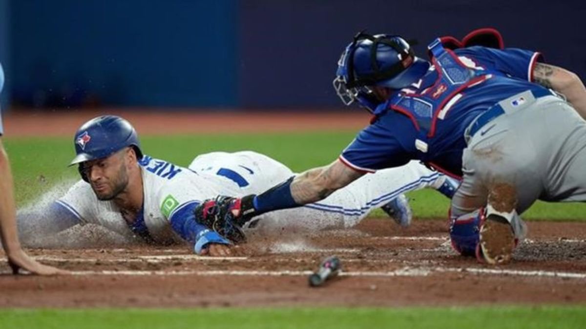 Heim hits grand slam as Rangers dump Jays 10-4 in opener of key four ...