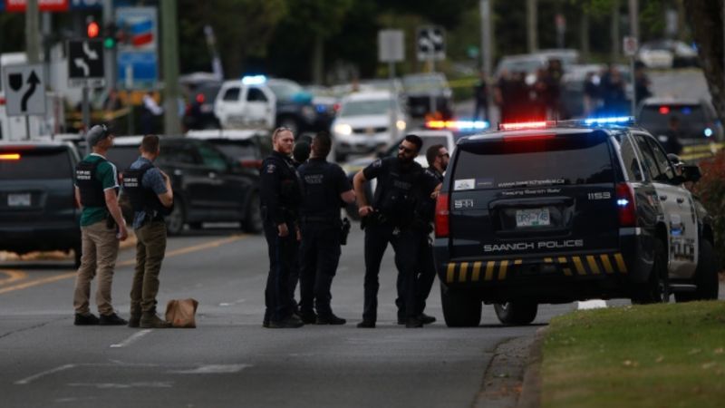 Two suspects dead, six officers injured in B.C. bank shooting ...